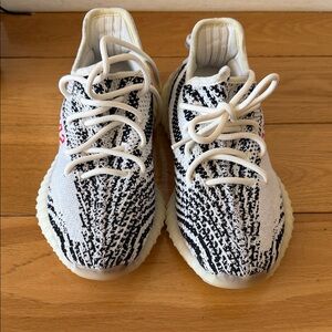 Yeezy Boost 350 V2 Zebra White Black with Red Accent
Men size